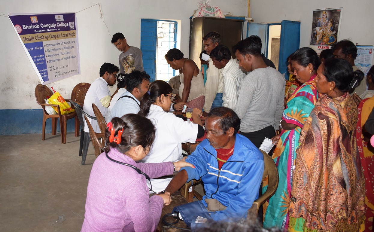 Health Checkup going on during Health Camp organized by College